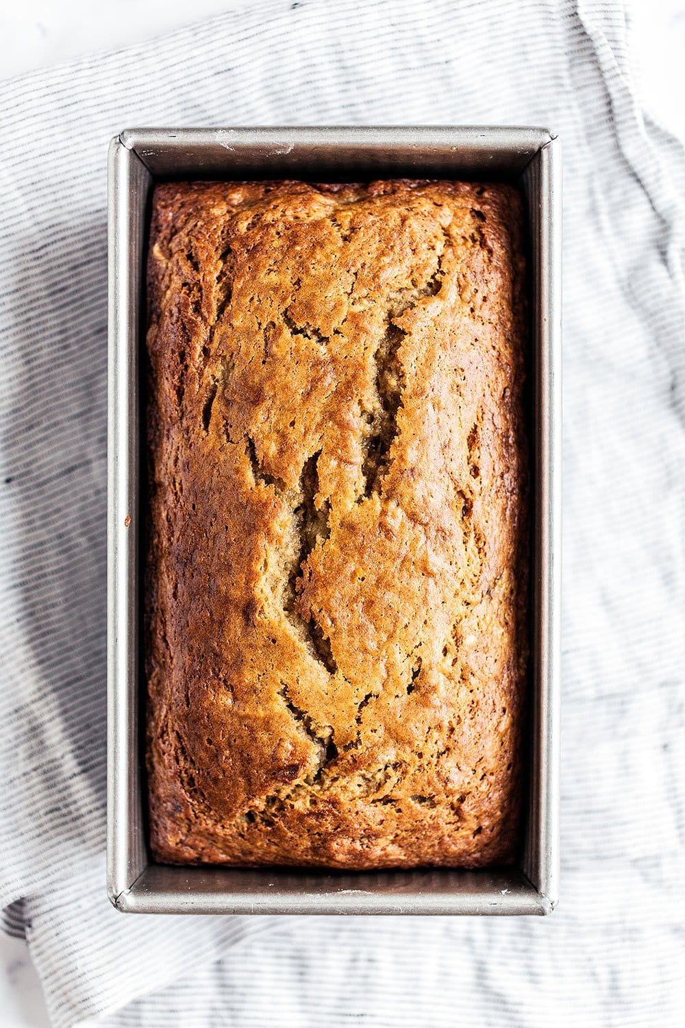 banana bread baked in a metal pan