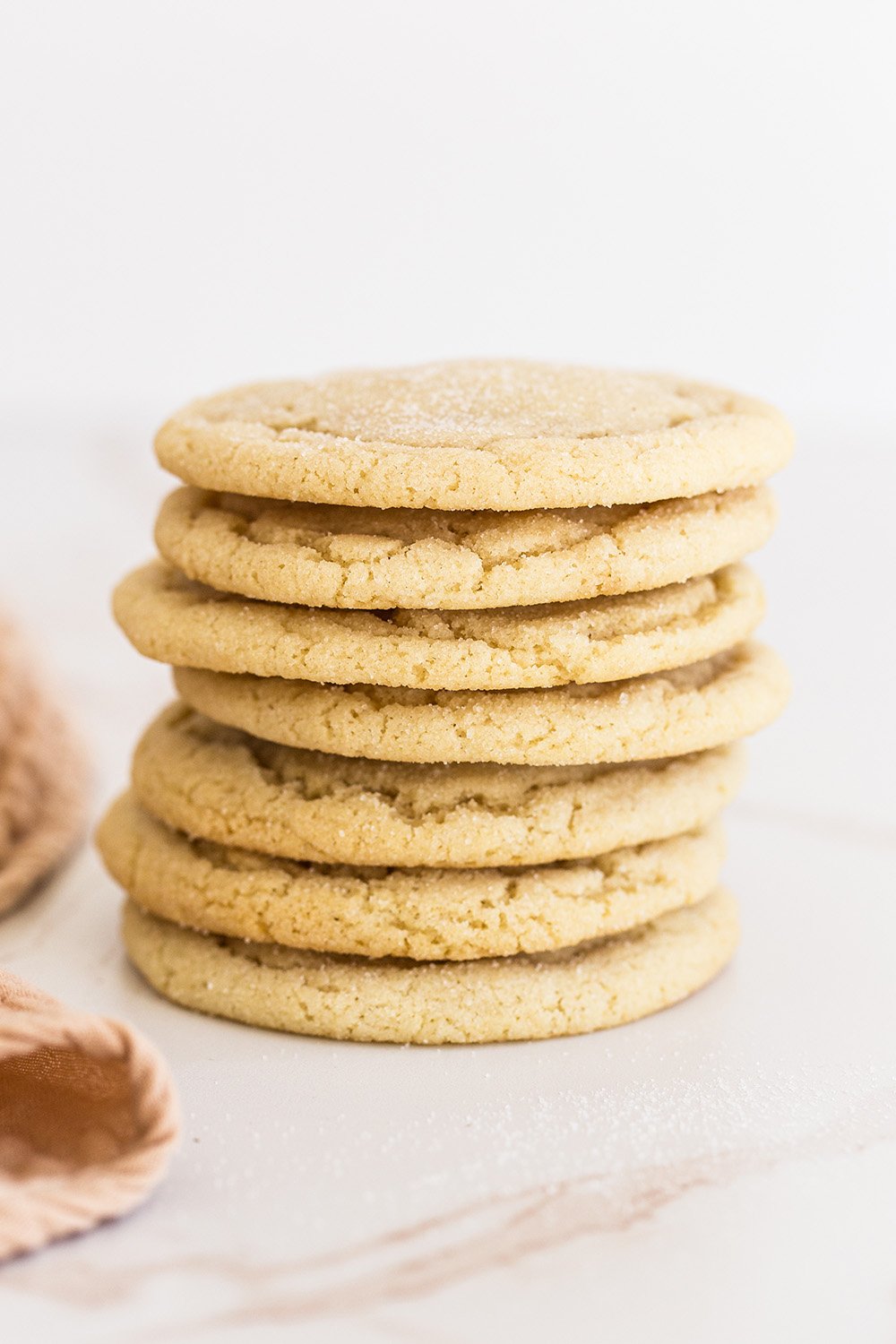 soft drop-style sugar cookie recipe, showing several stacked cookies