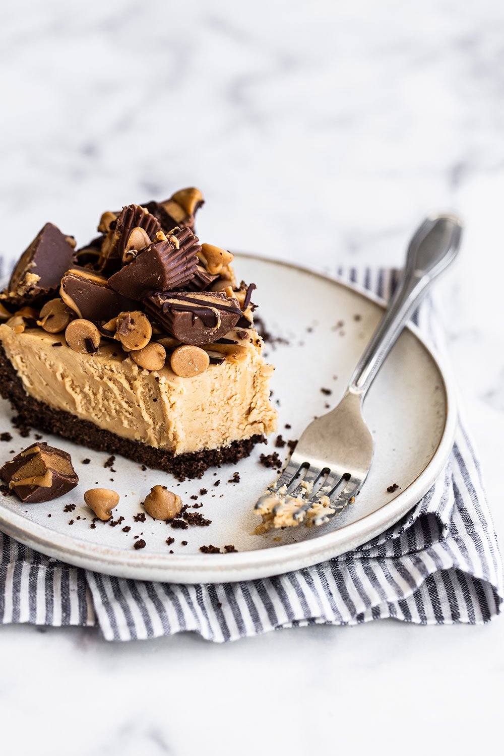 Slice of pie with a fork on a plate