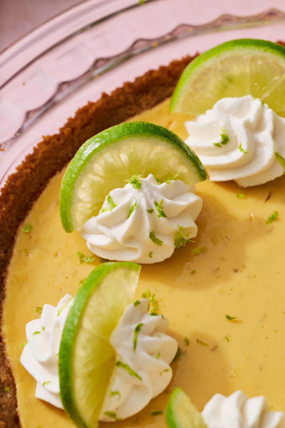 closeup of the whipped cream and fresh lime zest on top of the pie.