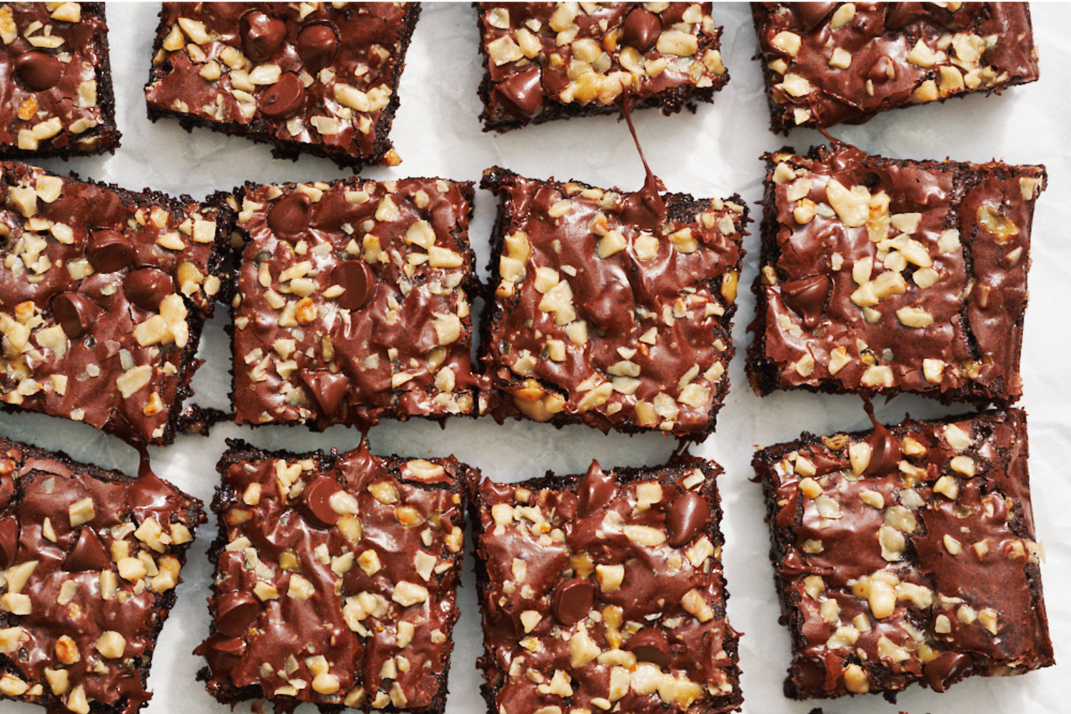 slices of brownie with gooey chocolate between each slice.